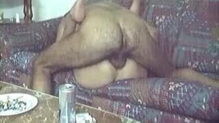 Он разводит ей ноги и трахает ее на диване