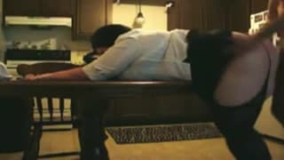 Он сгибает ее над столом и входит в нее сзади