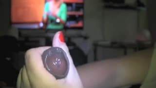 Она делает его большой чёрный член жёстким